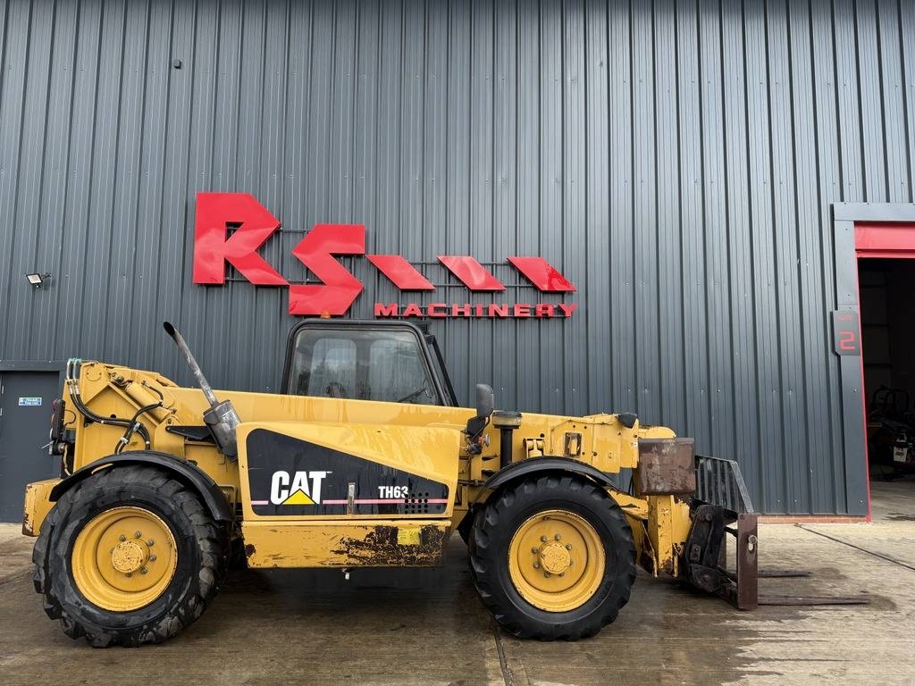 Chariot télescopique Caterpillar TH 63 12.5m — occasion 2002, 9 862 h