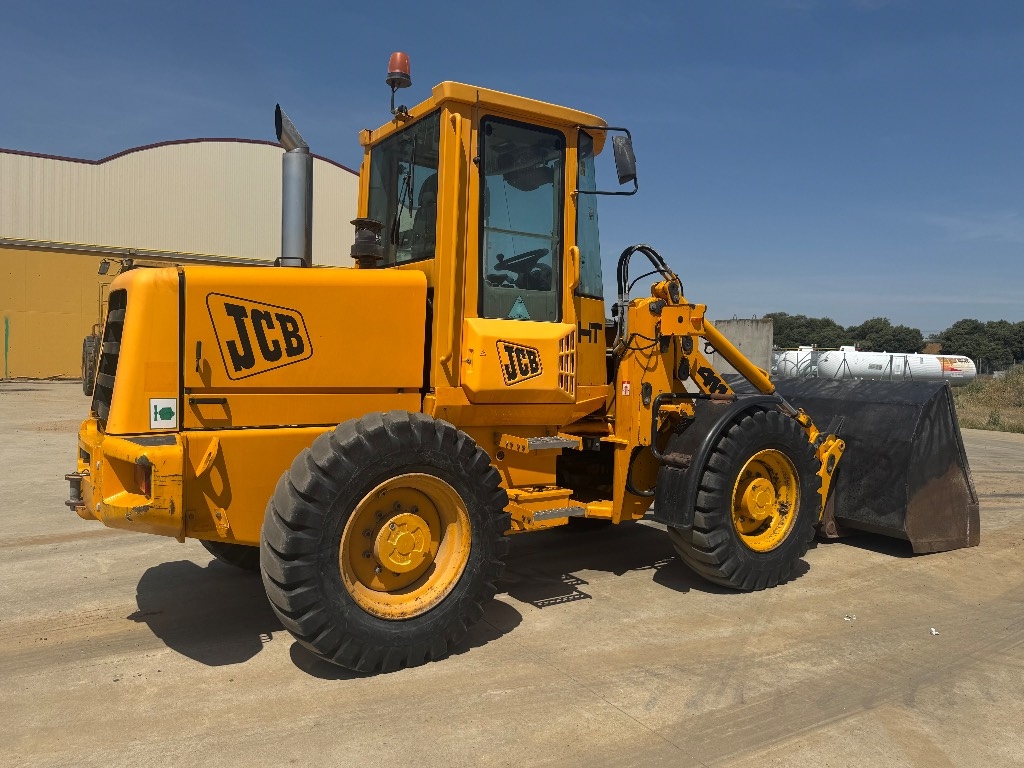 Chargeuse sur pneus JCB 411 B — occasion 2000, 2 500 h