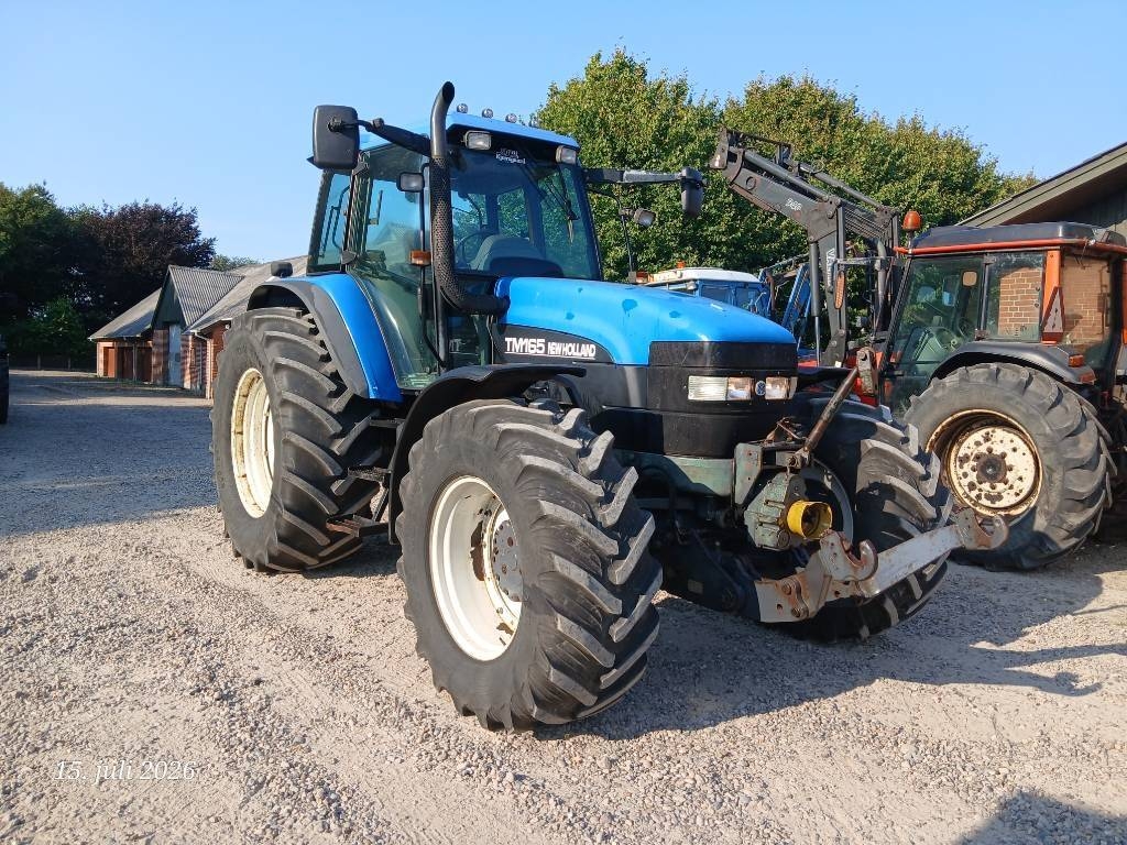 Tracteur agricole New Holland TM 165 med frontlift og front pto — occasion 2002, 12 000 h