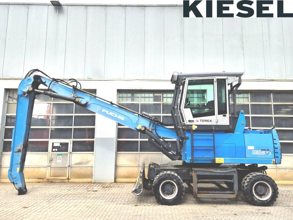 Pelle de manutention Fuchs MHL 334 E — occasion 2015, 11 510 h