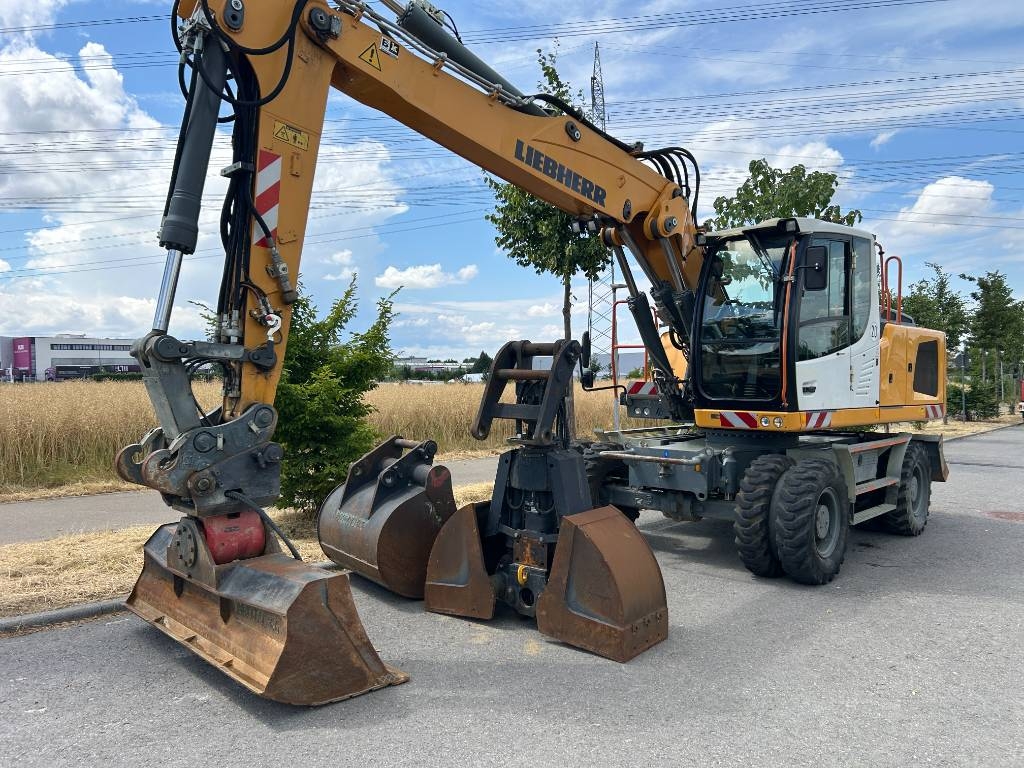Pelle sur pneus Liebherr A 920 incl Greifer TL GRL Top Zustand 9880 Std — occasion 2014, 9 880 h