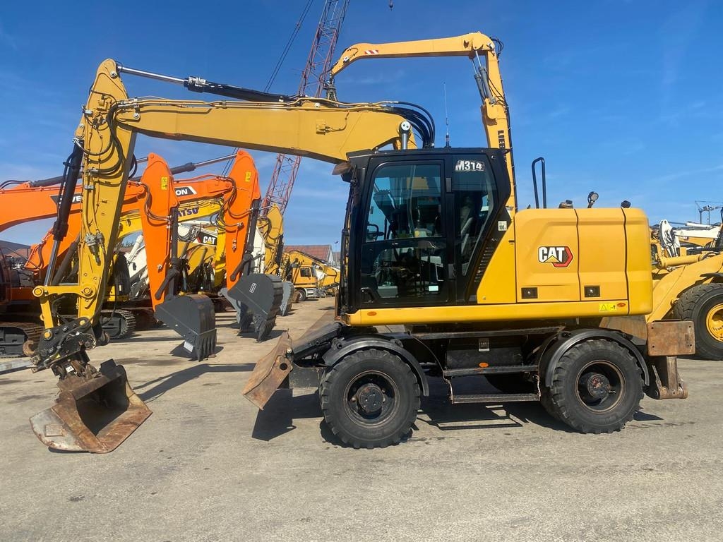 Pelle sur pneus Caterpillar M314 07B next gen . — occasion 2022, 5 180 h