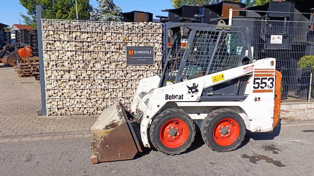 Chargeuse compacte Bobcat 553 Kompaktlader, 1.471 Bh, Allrad (4x4), 1.737 kg — occasion 2001, 1 471 h