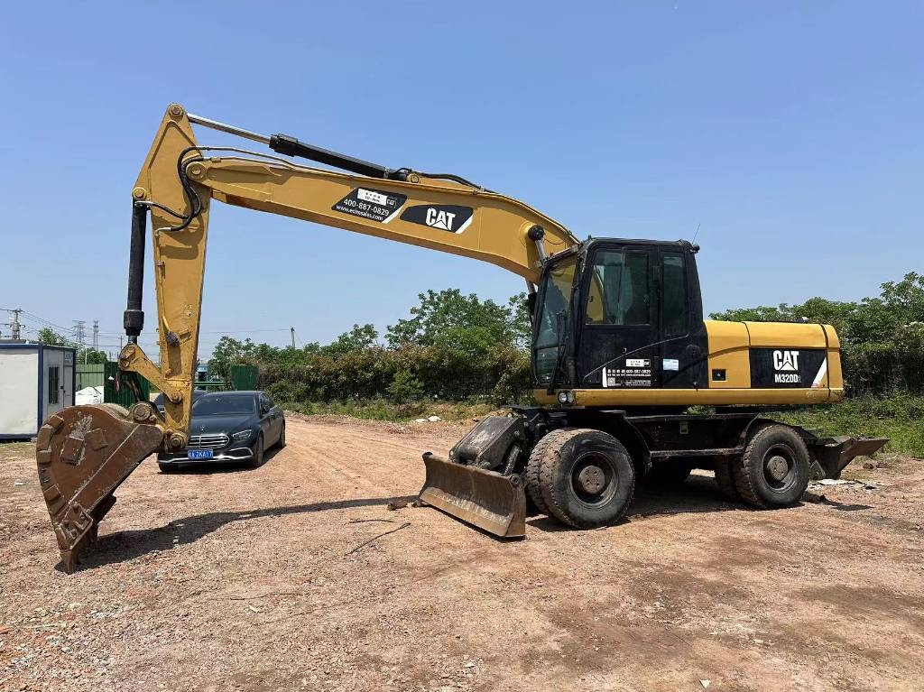 Pelle sur pneus Caterpillar M320D CAT M320D2 — occasion 2021