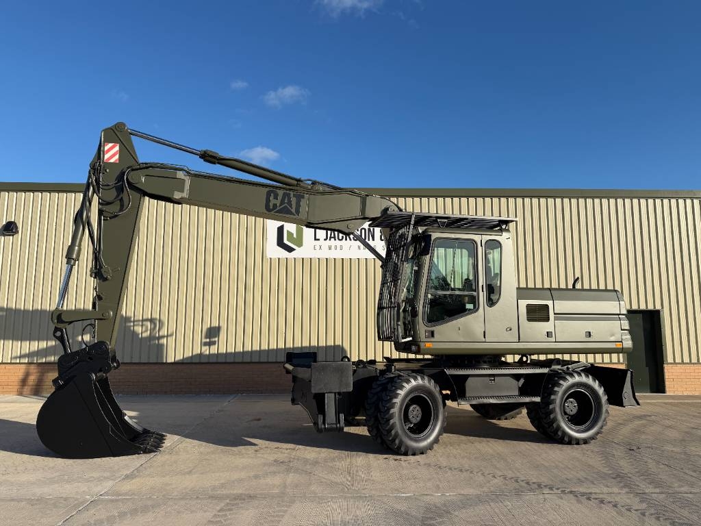Pelle sur pneus Caterpillar M 318 — occasion 2000, 3 106 h