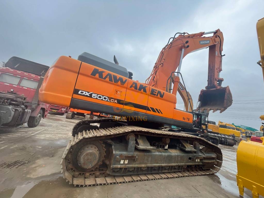 Pelle sur chenilles Doosan DX 500 LCA — occasion 2024