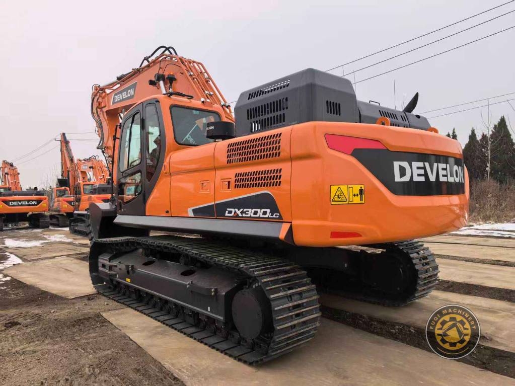 Pelle sur chenilles Develon DX 300 LC — occasion 2026