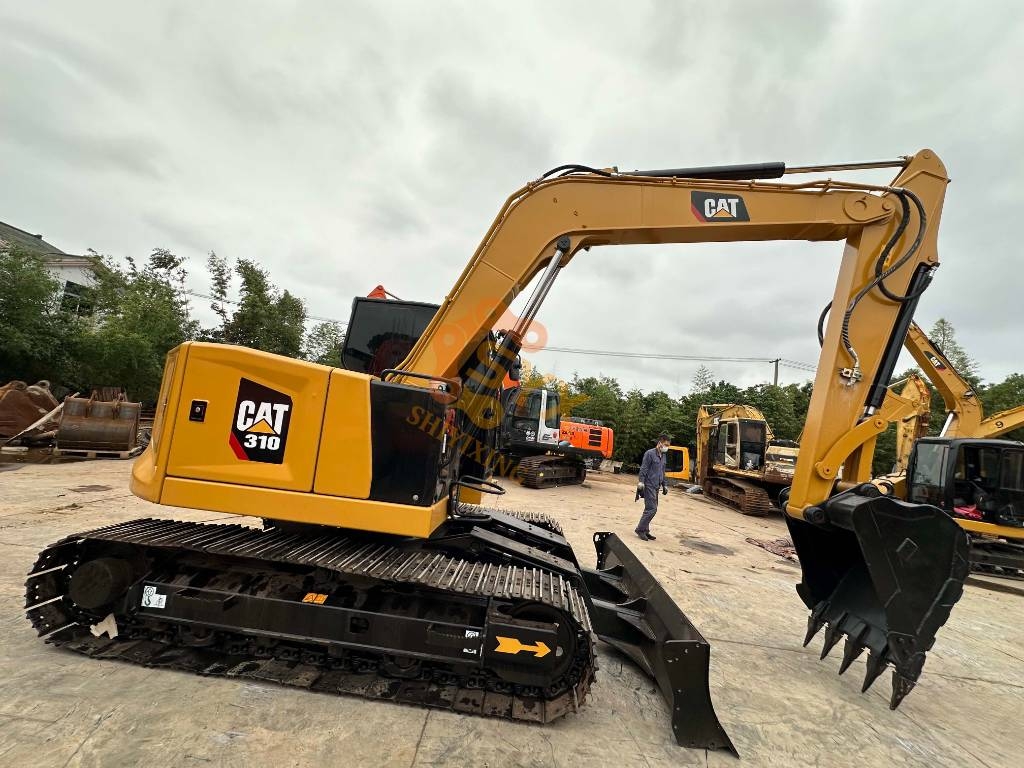 Pelle sur chenilles Caterpillar 310 — occasion 2025