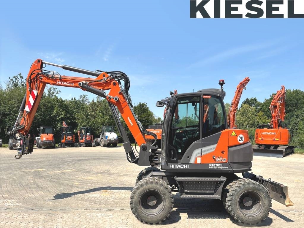 Pelle sur pneus Hitachi ZX 95 W-7 — occasion 2024, 730 h