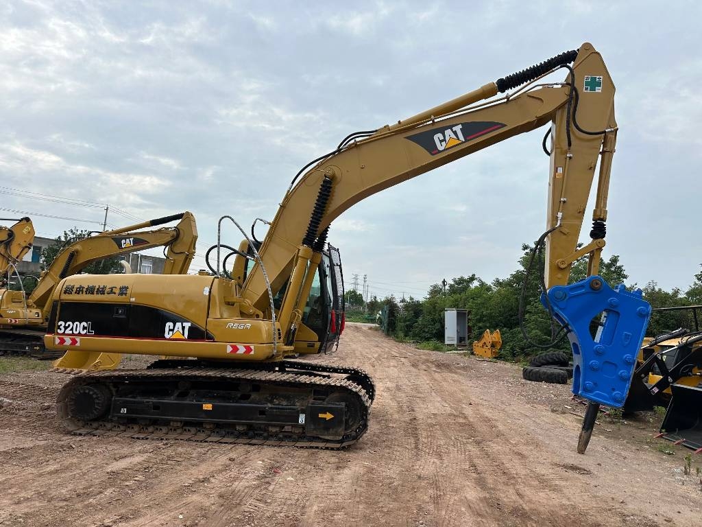 Pelle sur chenilles Caterpillar CAT 320 C CAT 320CL — occasion 2021, 1 125 h