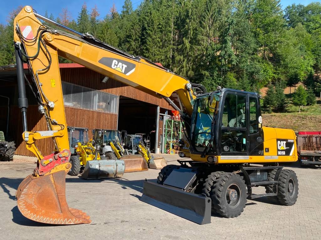 Pelle sur pneus Caterpillar M 315 D — occasion 2015, 9 540 h