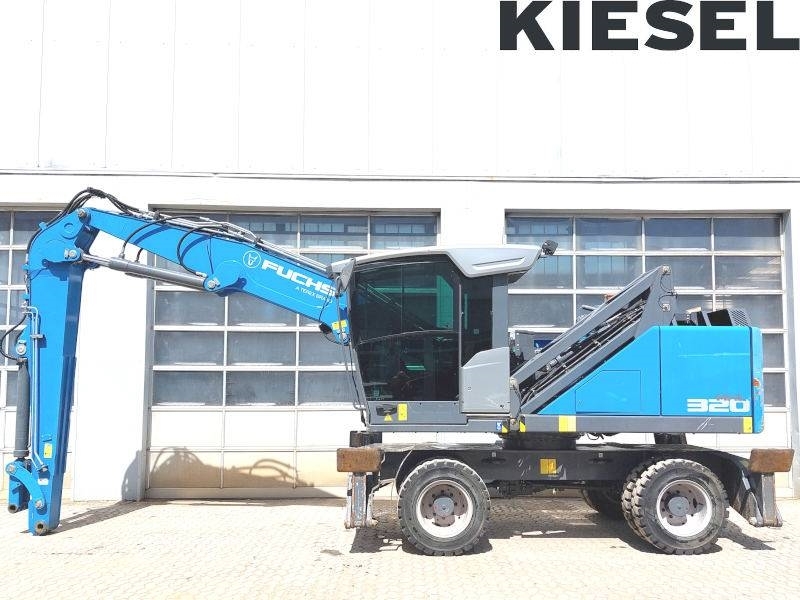 Pelle de manutention Fuchs MHL 320 F — occasion 2019, 18 380 h