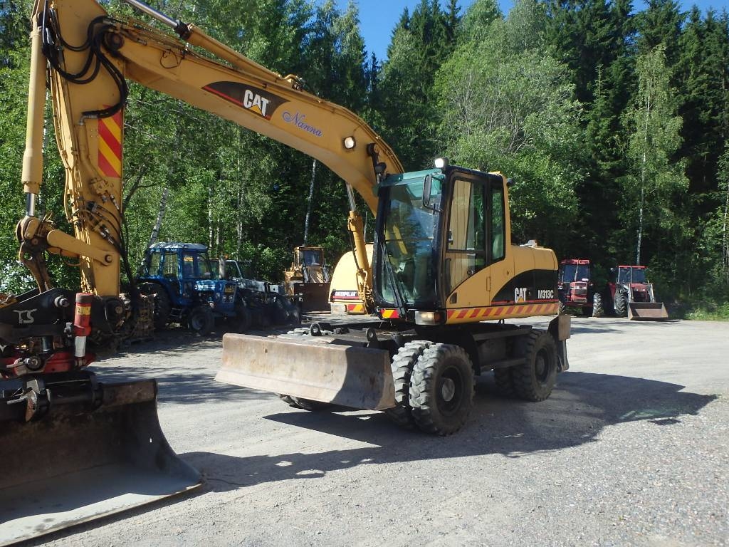 CAT M 313 C rototiltillä