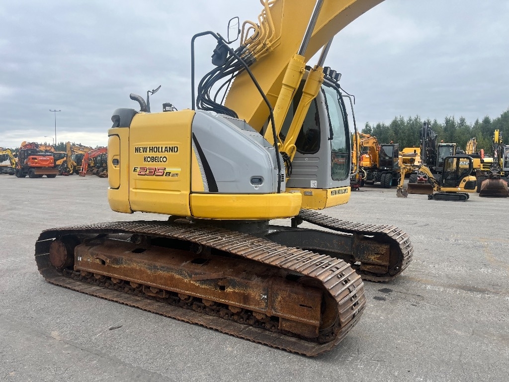 New Holland E 235 B SR / Rotátor, vedro, mazivo kuva 6