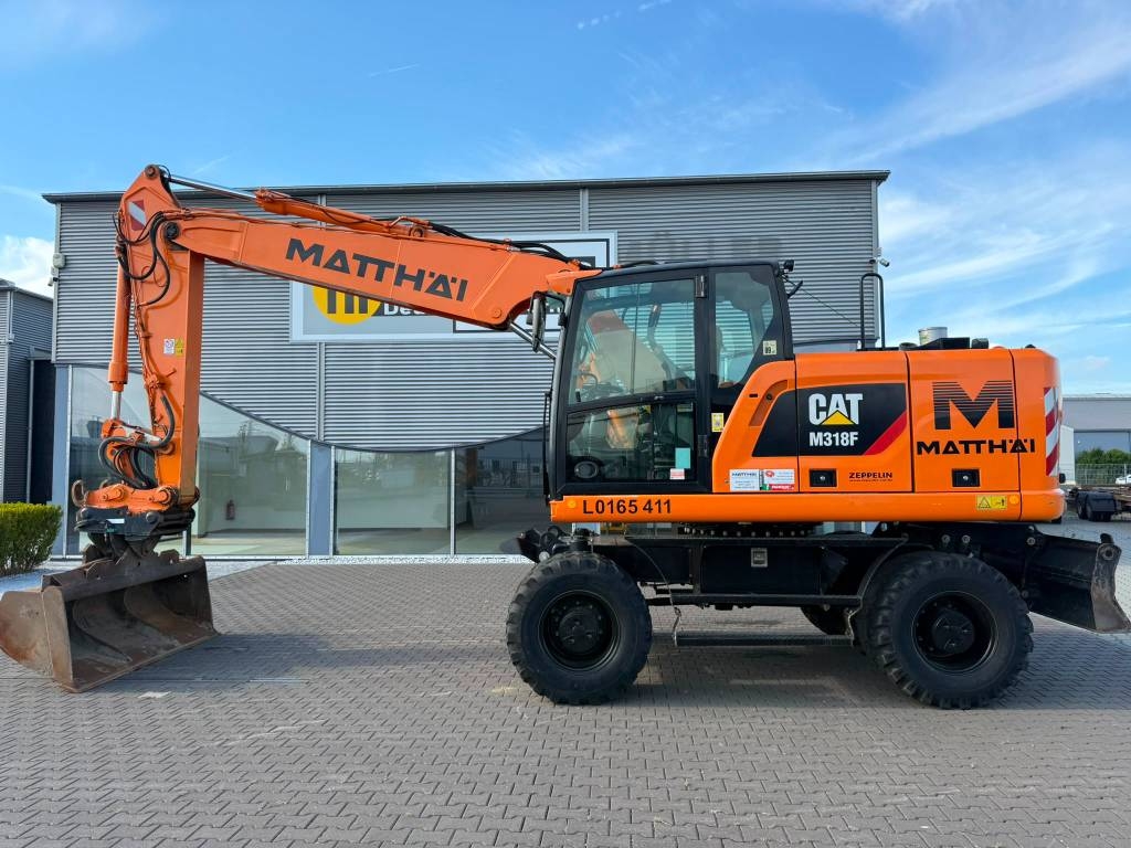 Pelle sur pneus Caterpillar M 318 F — occasion 2018, 8 397 h