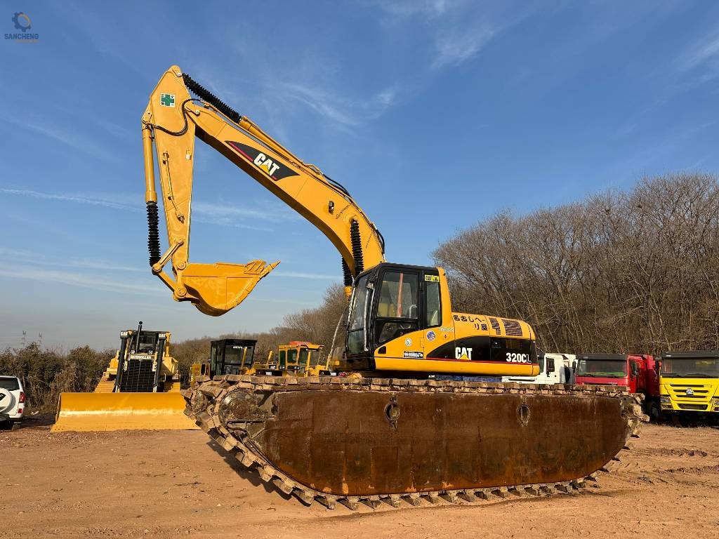 Pelle de manutention Caterpillar 320C — occasion 2022, 924 h