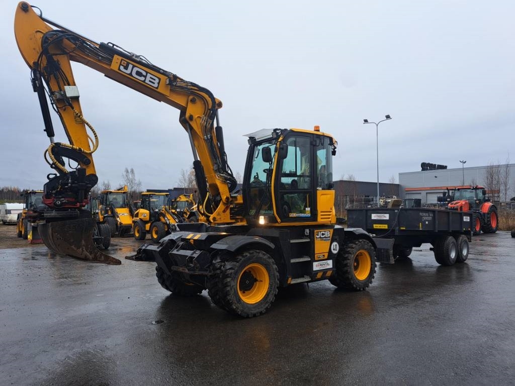 Pelle sur pneus JCB 110 W Hydradig / Rototilt Pihdeillä — occasion 2023, 3 900 h