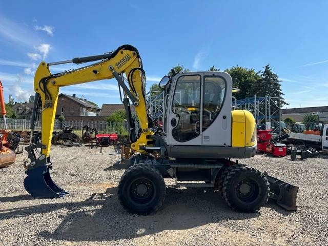 Pelle sur pneus Wacker Neuson EW 100 / AC/ 49.000 EUR — occasion 2019, 4 676 h