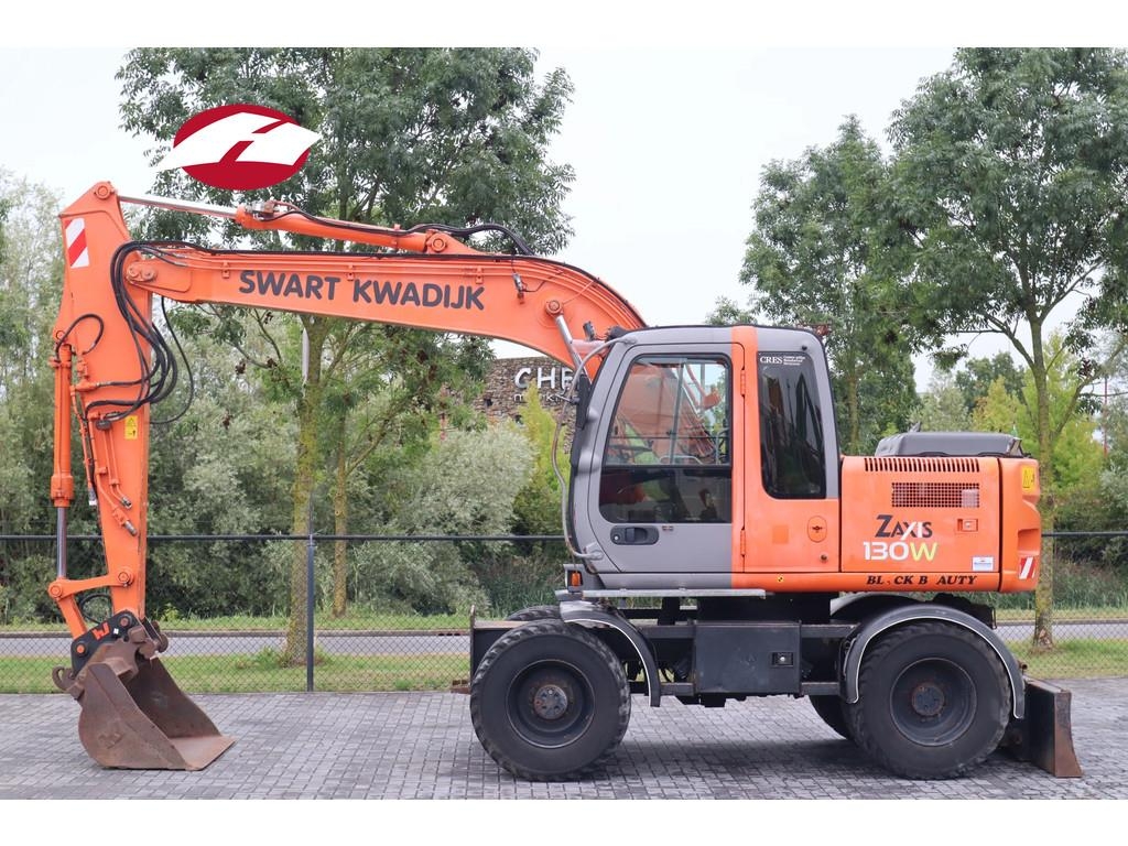 Pelle sur pneus Hitachi ZX130 | QUICK COUPLER | BUCKET | DOZERBLADE — occasion 2006, 15 603 h