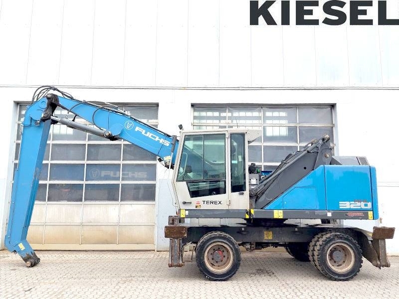 Pelle de manutention Fuchs MHL 320 F — occasion 2016, 10 410 h
