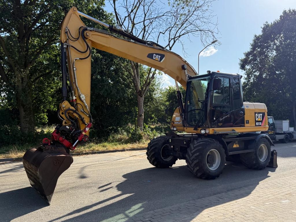 CAT M313D