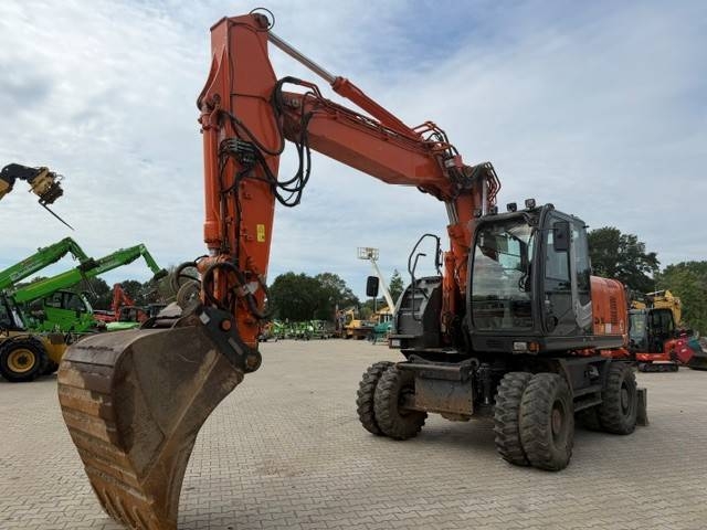 Pelle sur pneus Hitachi ZX 170 W-3 — occasion 2011, 12 873 h