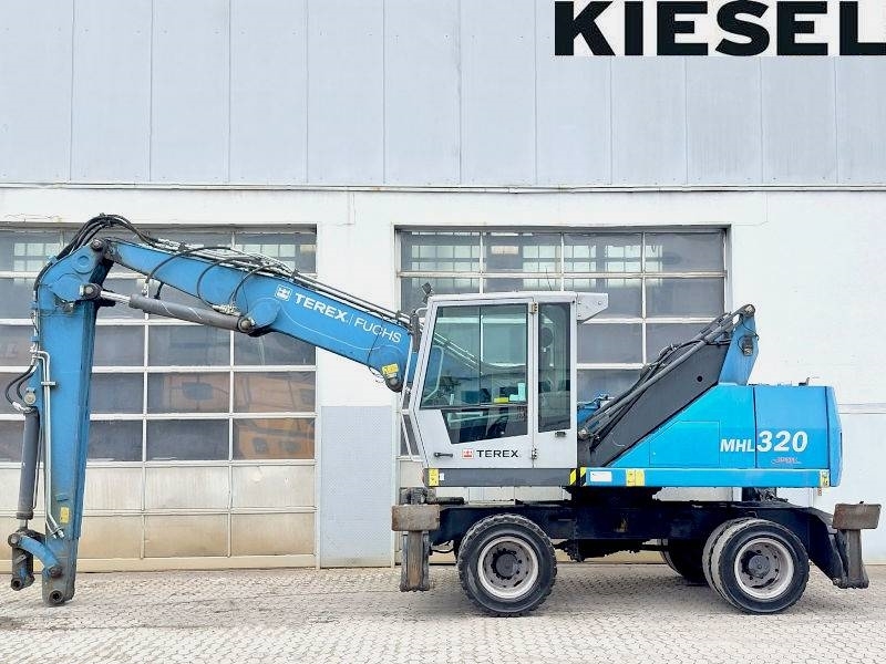 Pelle de manutention Fuchs MHL 320 D — occasion 2016, 12 135 h