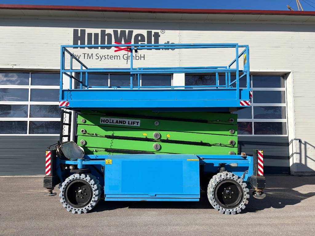 Nacelle à ciseaux Holland HL190 H20 - 18,60m Hybrid 4x4 Scherenarbeitsbühne — occasion 2016, 1 069 h