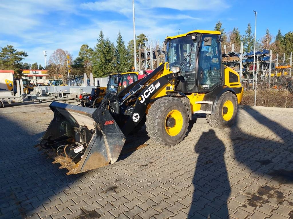 Chargeuse sur pneus JCB 409 — occasion 2023, 300 h