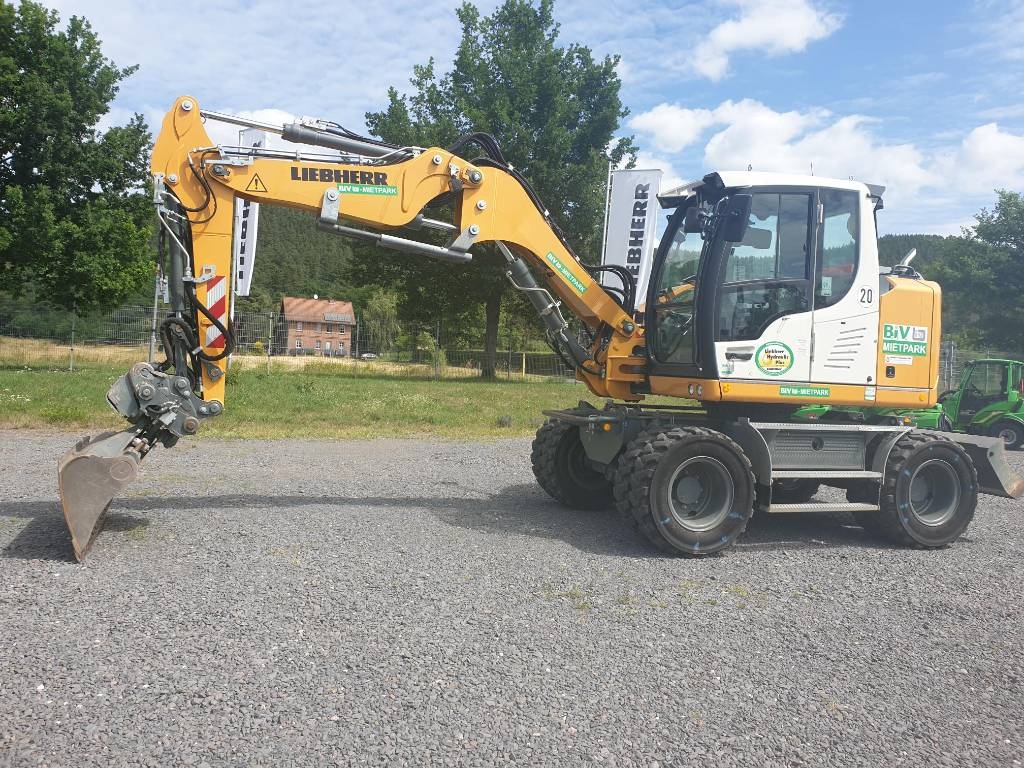 Pelle sur pneus Liebherr A 910 Compact Litronic — occasion 2023, 1 235 h