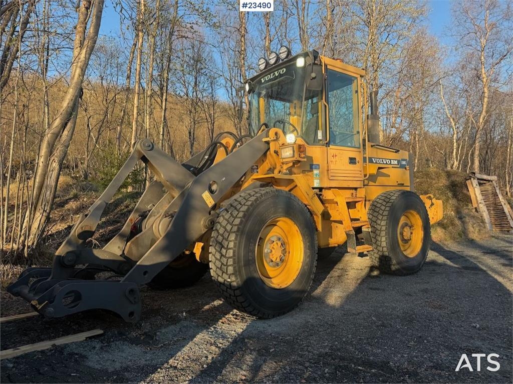 Volvo L50C wheel loader w/ 3 buckets, pallet forks, plow