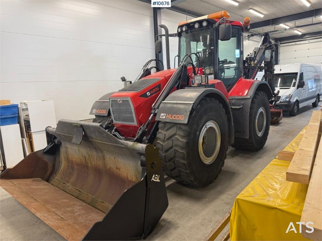 Huddig 1260C with Rototilt and buckets
