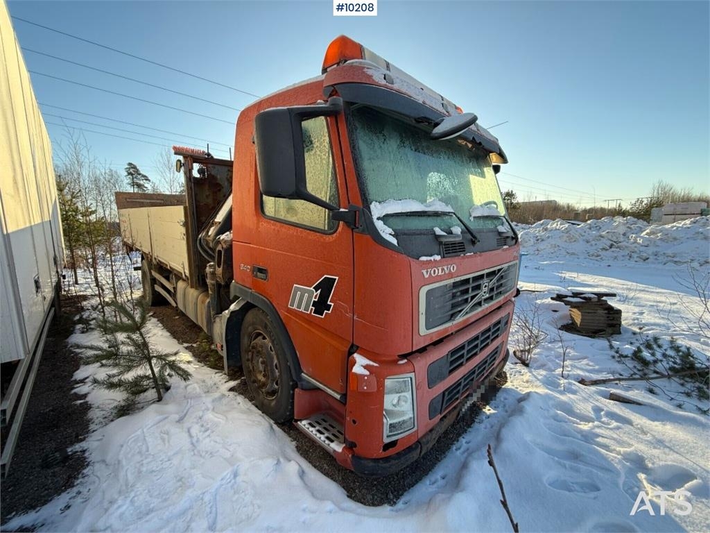 Volvo FM9 4X2 Flatbed truck with tail lift