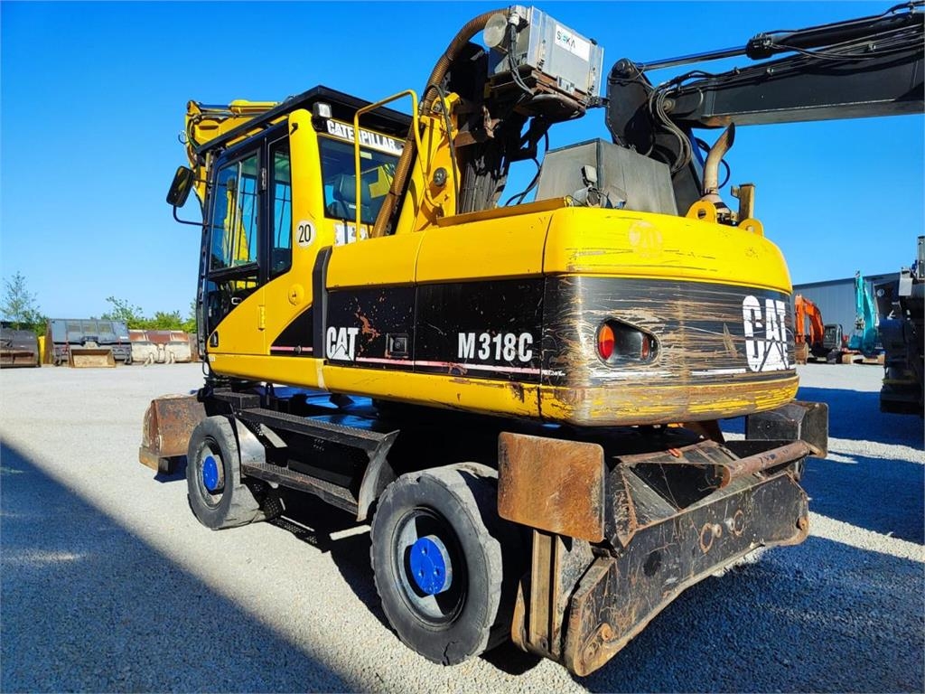 Pelle de manutention Caterpillar M318C — occasion 2007, 13 620 h