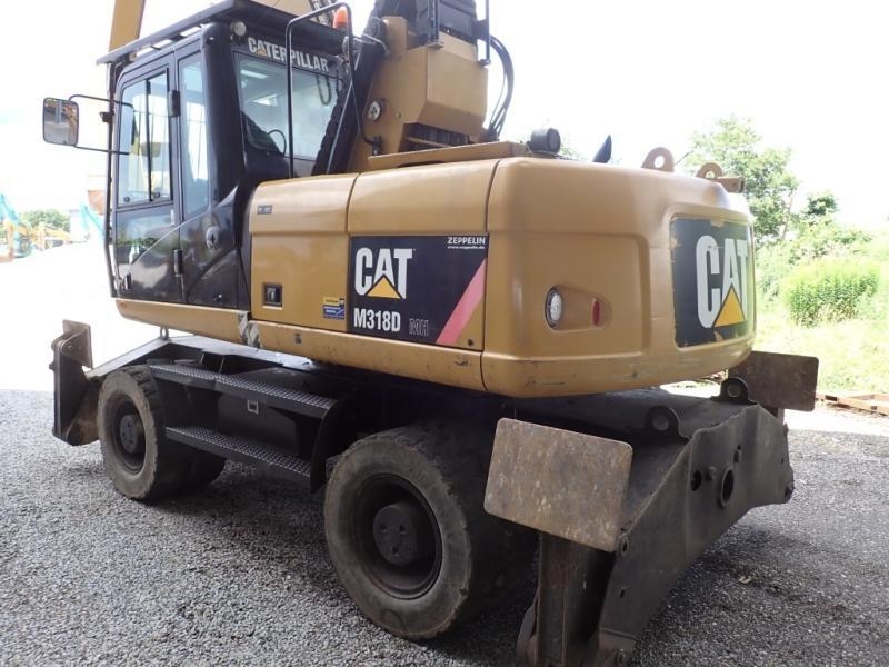Pelle de manutention Caterpillar M318D MH — occasion 2010, 8 650 h