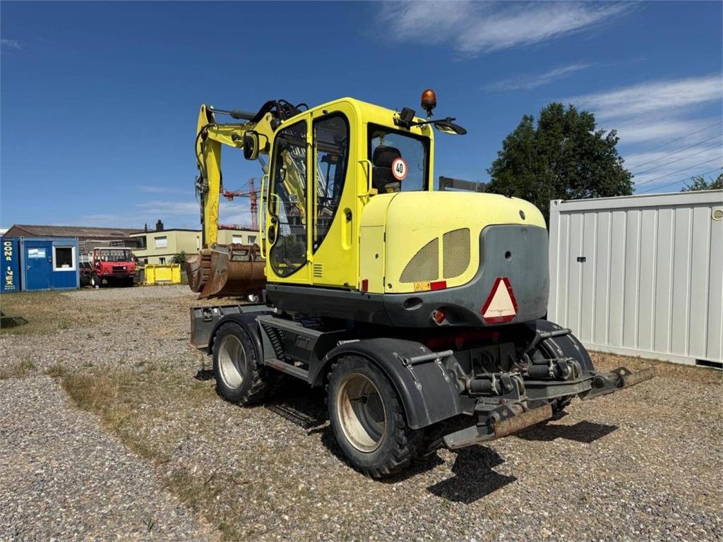 Pelle sur pneus Wacker Neuson EW100 — occasion 2016, 6 329 h
