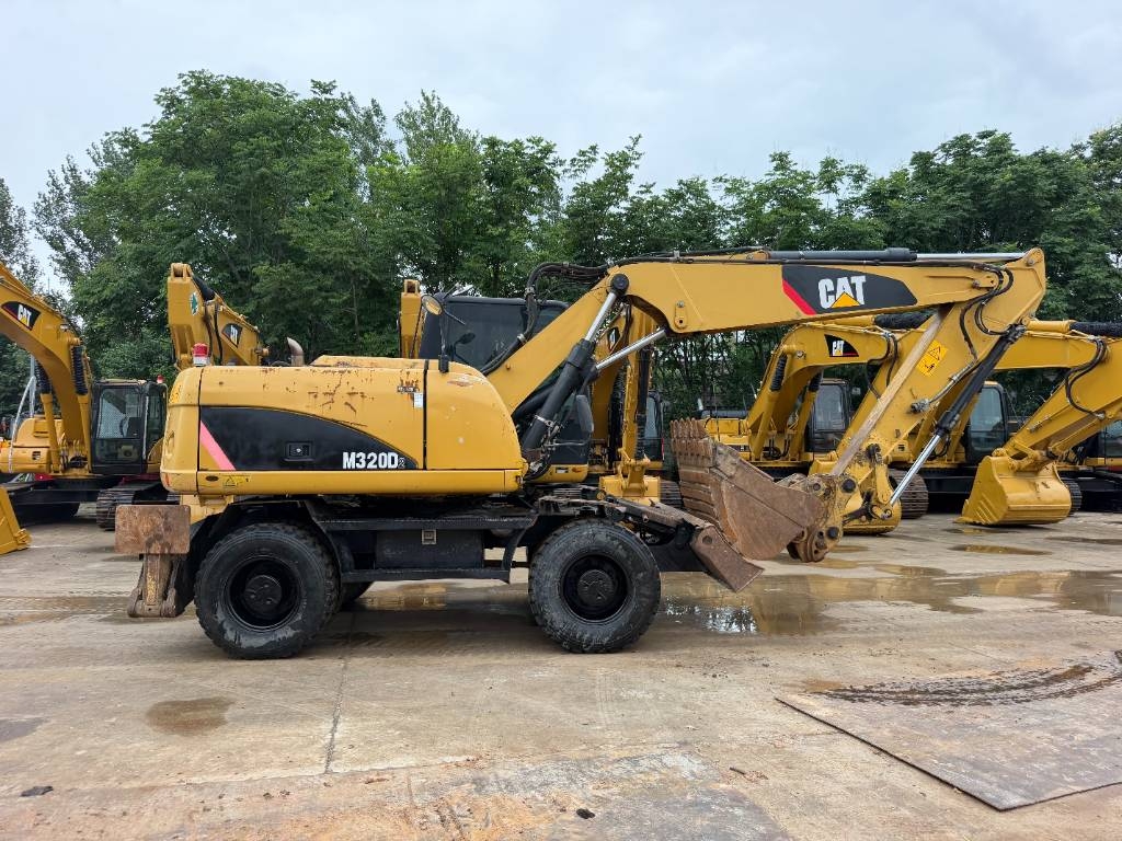 Pelle sur pneus Caterpillar M320D2 — occasion 2020