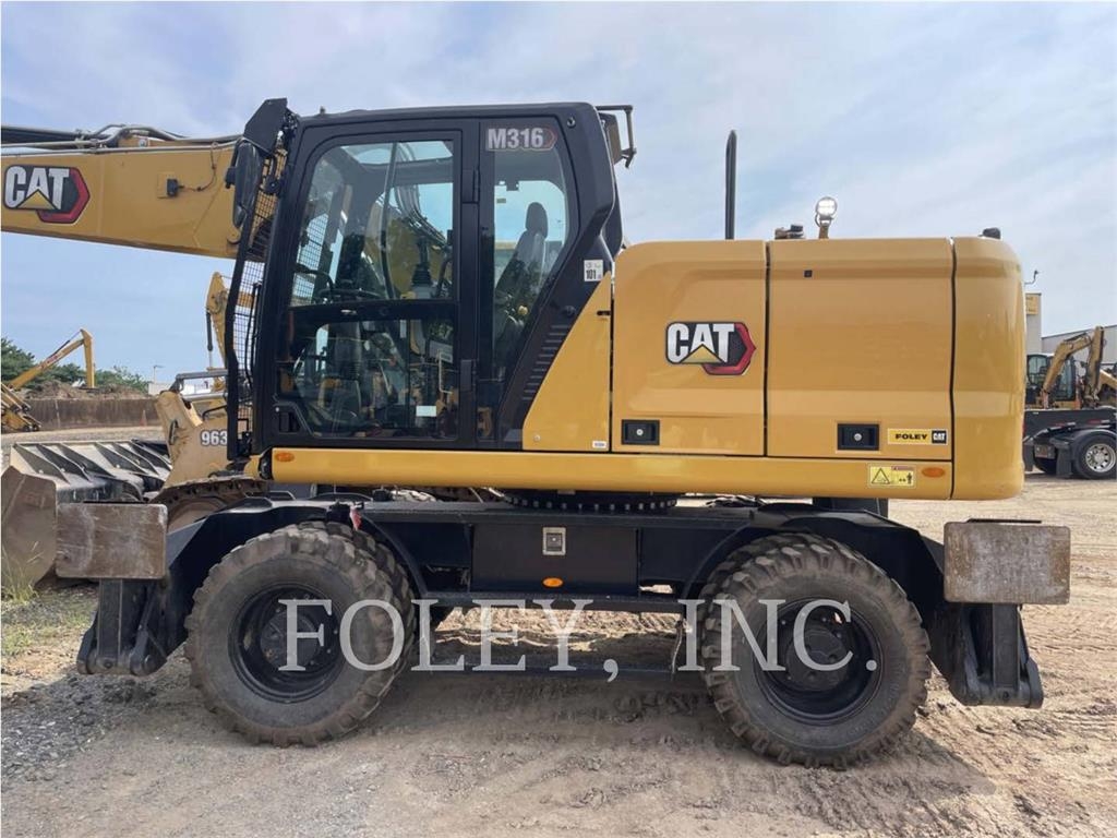 Pelle sur pneus Caterpillar M316-07 — occasion 2024, 931 h