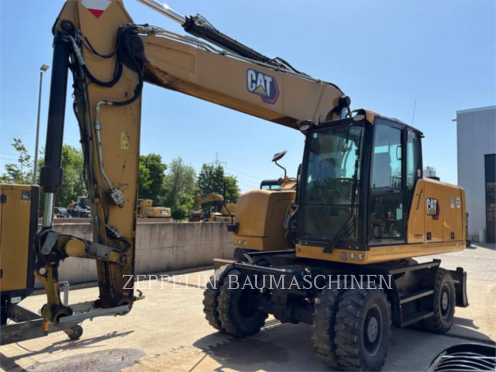 Pelle sur pneus Caterpillar M320F — occasion 2021, 5 752 h