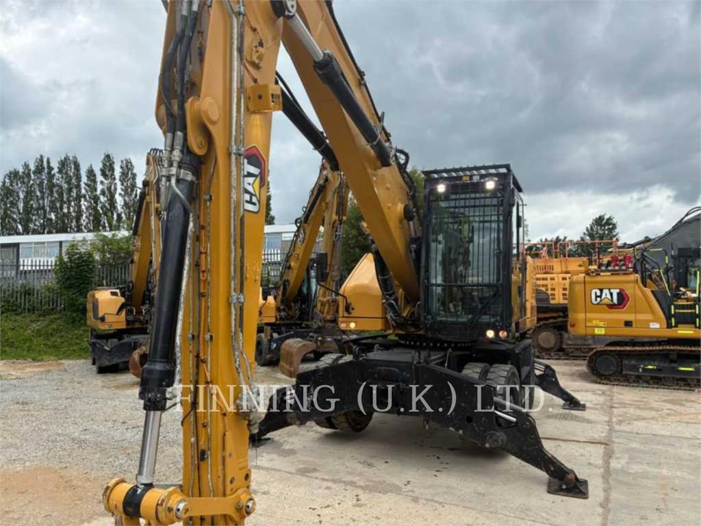 Pelle sur pneus Caterpillar MH3022-06 — occasion 2021, 5 108 h