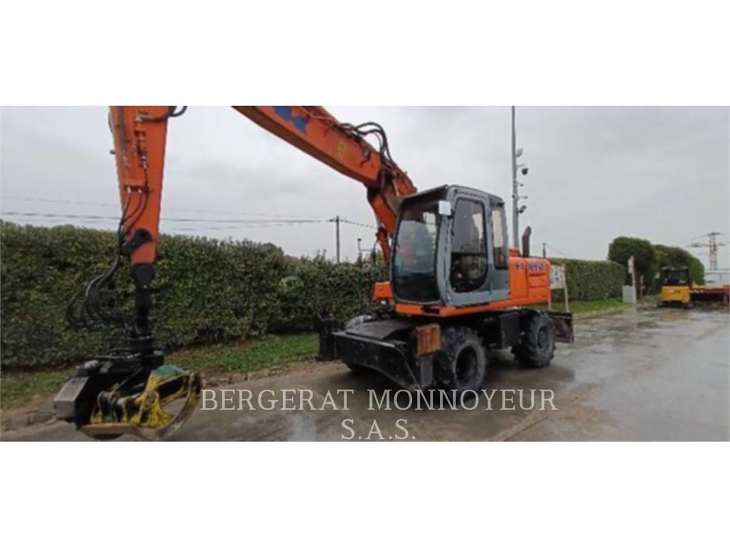 Pelle sur pneus Fiat Fiat-Kobelco EX165W — occasion 2002, 11 444 h