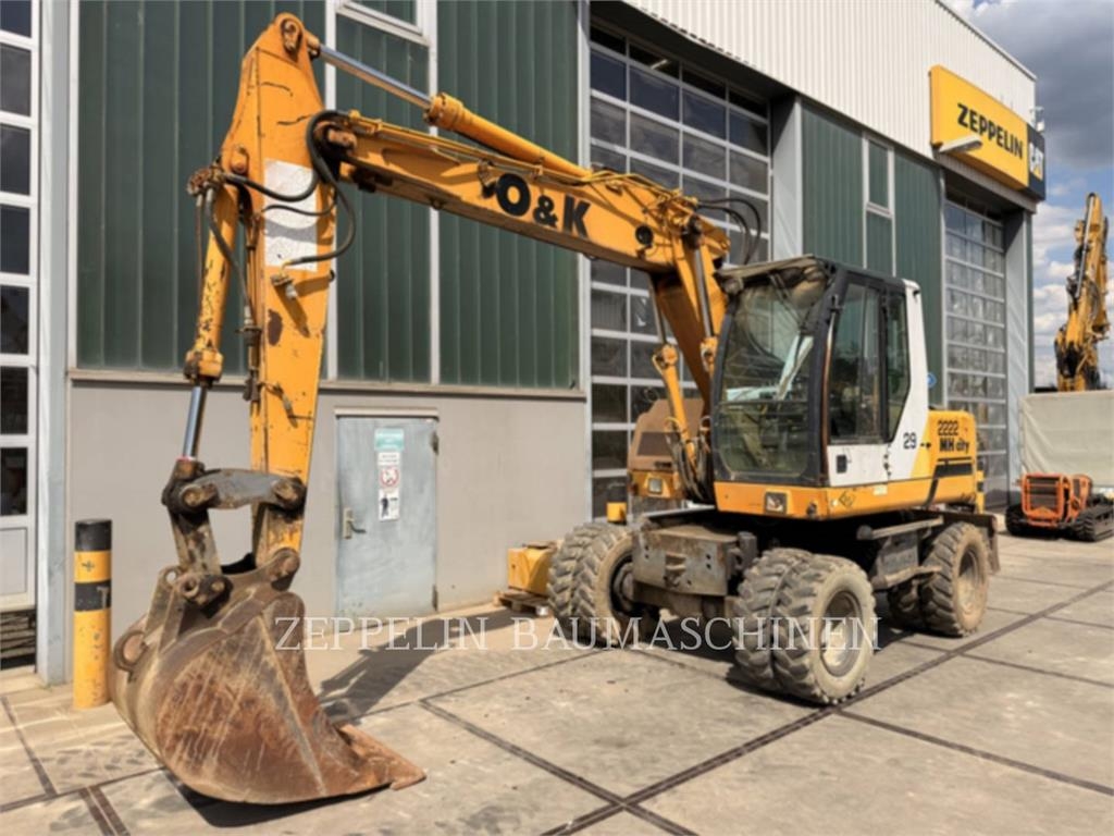 Pelle sur pneus O&K MH4CITY — occasion 1999, 11 000 h