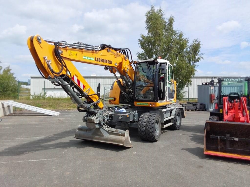 Pelle sur pneus Liebherr A 914 Compact Litronic — occasion 2023, 1 480 h