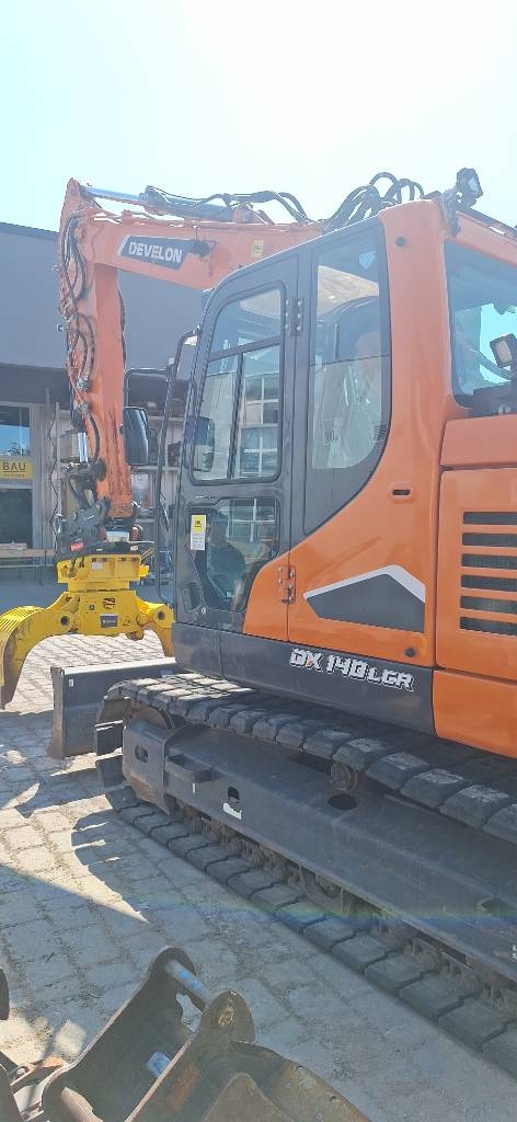 Pelle sur pneus Develon DX 140 LCR/V-7 — occasion 2024, 1 200 h
