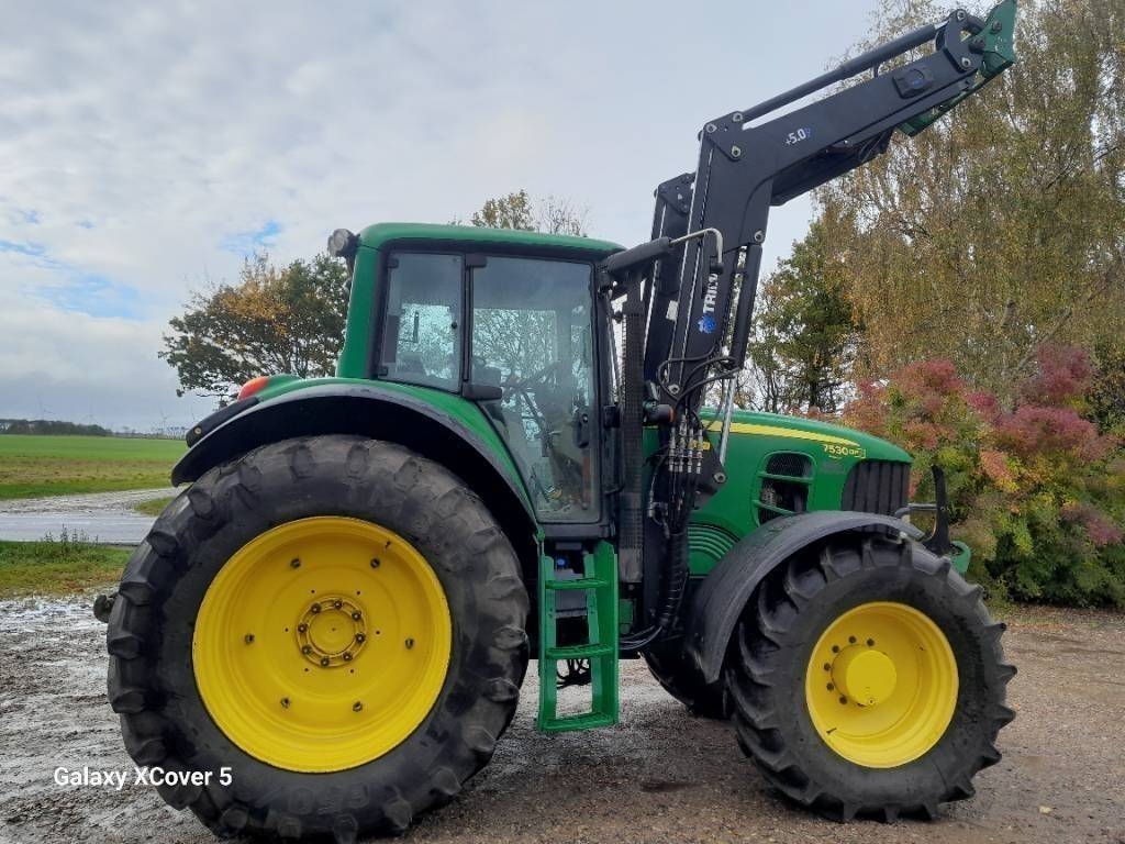 John Deere 7530 Auto Quard med frontlæsser og frontlift