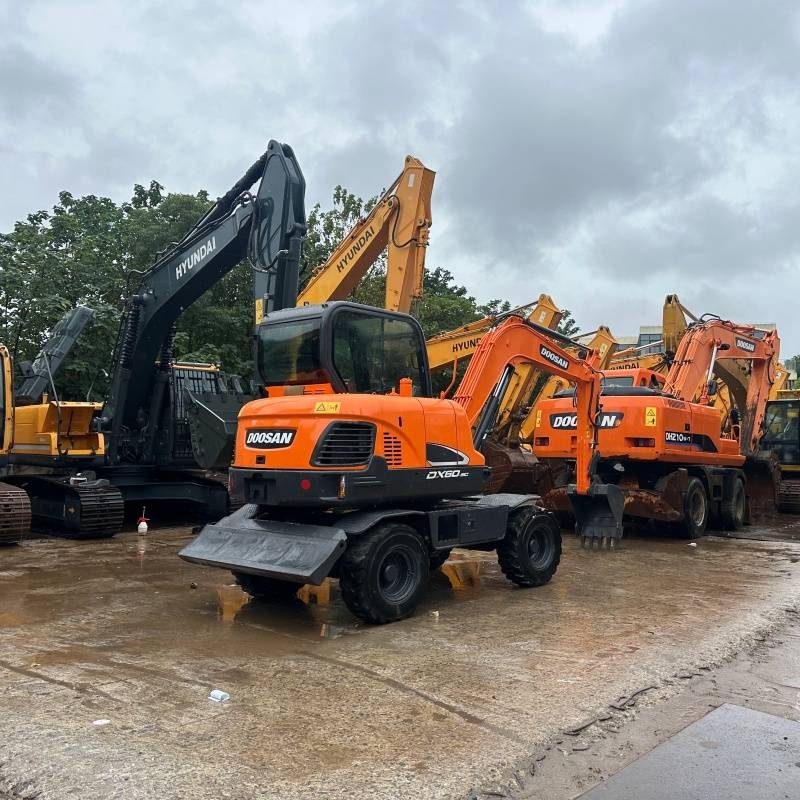 Pelle sur pneus Doosan DX60W-9C — occasion 2023, 1 430 h