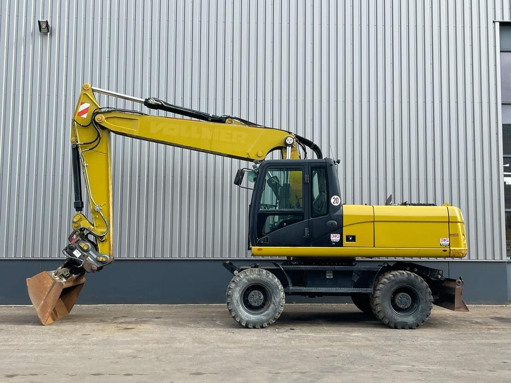 Pelle sur pneus Caterpillar M322D — occasion 2011, 11 459 h