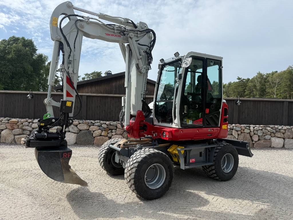 Pelle sur pneus Takeuchi TB370W — occasion 2025, 340 h