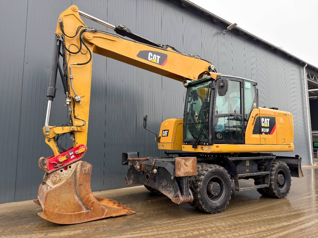 Pelle sur pneus Caterpillar M318F — occasion 2015, 9 563 h