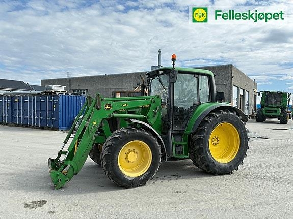John Deere 6330 med laster